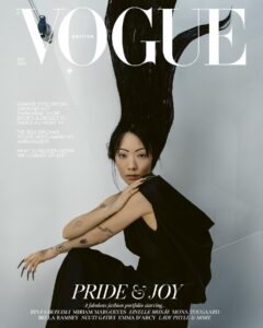 Rina Sawayama Instagram - At 32, @RinasOnline has established herself as part of a new generation of music stars reshaping the industry model to fit their own mould. And, she tells @LiamNHess, she’s only just getting started. In the July 2023 issue of @BritishVogue, the cover star talks about her third album, taking her first steps as an actor and why being a queer Asian musician is “freeing”. Click the link in bio to read the profile in full, and see the full story in the new issue, on newsstands Tuesday 20 June. #RinaSawayama wears all @Givenchy, photographed by #TimWalker and styled by @KPhelan123, with hair by @AliPirzadeh, make-up by @TerryBarberOnBeauty, nails by @Simmy_NailsAndBeauty, set design by @MigsBento and production by @Zoe_Wassall at @GreatSouthernProductions. [Image Description: Image shows Rina Sawayama, a Japanese-British woman with black hair, on the cover of British Vogue. She is dressed all in black, and sitting on a stool against a grey backdrop, with her body angled to the right and her head turned towards the camera. Her long black hair is standing up vertically and her fingernails are long and filed into a point. Her left arm is resting on her knee, and her right arm is folded on top, with her chin resting on her hand. Above her head, the Vogue logo in big white letters. The cover also reads: “Pride & Joy.“]