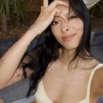 Rina Sawayama Instagram - body is in Texas, mind is in Ibiza 🧘🏻‍♀️