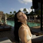 Rina Sawayama Instagram - body is in Texas, mind is in Ibiza 🧘🏻‍♀️