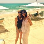 Robin Wright Instagram - Wayback Wednesday! Last decade #waybackwednesday Taking in the sun with my dear friend and Co-founder of Pour Les Femmes @pourlesfemmesofficial #pourlesfemmes #onthebeach #loungewear #pajamas #mercimonamie