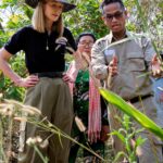 Rosamund Pike Instagram – Earlier this year, I visited Cambodia to meet MAG’s team of expert deminers and meet their community liaison teams. In the UK, children need to know how to cross a road safely. In Cambodia it is vital that they also know the difference between a shiny object found on their way to school and a landmine. 
If you donate to MAG’s life changing work between now and the end of May, your donation will be doubled by a generous MAG supporter, making double the difference for families in Cambodia. A gift of £25 (doubled to £50) could help deliver life-saving risk education lessons to communities for two days!!!