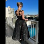 Rosamund Pike Instagram - This dress ! 2019 @dior Haute Couture by @mariagraziachiuri. The net chemise was remade for me by a relocated atelier brought here to LA from Paris… this dress is structured and soft, it floats and yet holds its shape. It is exquisite. Hair by my friend and collaborator @davidebarbieri_ inspired by the appliqué flowers on the dress and the chemise. Hat by the miraculous @philiptreacy who can float dreams and stories atop people’s heads. Makeup by @melaniemakeup complimenting the mystery of the veils. Styling by @leithclark We all spent the day feeling inspired and there was an air of enchantment . Thank you @prosper_pr for making it all so special.