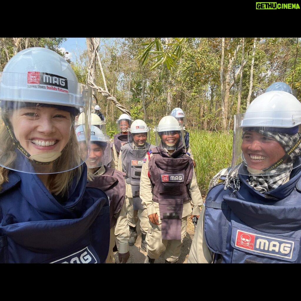 Rosamund Pike Instagram - In Battambang Province Cambodia, once again seeing with my own eyes the tireless efforts of teams of female deminers, working in swelteringly hot conditions protected by heavy, constrictive PPE, on uneven terrain. The undergrowth they have to clear to find the mines, remnants of wars over 30 years past, is dense, tangled and resistant. Many families live face to face with land still heavily contaminated with unexploded ordnance. The efforts of MAG are sensitive, expert, dedicated and inspiring. #proudambassador #landmines #cambodia
