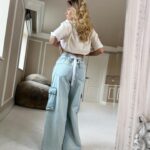 Rosie McClelland Instagram - “I like that I’m not typical” 🤍 If the jeans don’t fit find some ribbon 🤍🎀 Check out my latest TikTok for bow tutorial (link in bio)