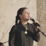 Salma Abu Deif Instagram - Self talk to the root letter, I’m Salma, a North African, Middle Eastern, Egyptian millennial, born and raised in Cairo in 1993. I was brought up to know God through Islam in a beautiful spiritual way. I grew up to know all Fayrouz’s songs and Soaad Hosni’s and Omar el Sherif’s movies. I was raised to gather every Ramadan with my beloved ones from family and friends. I knew Ramadan’s lights and the city that never sleeps. I grew up in an Egyptian education system knowing my country’s culture and history, learning about every other colonized country in our region to the point that I got lost between all of them. I grew up knowing my beloved country through our history and people till it got embodied in us. I grew up on the note that when you are living in bad circumstances, you always give to the other and thank God anyway . I grew up on the generosity of the people in my culture, learnt as if it’s an insult not to be a good host. I grew up with a Palestinian best friend who knew nothing but pureness of hearts until she had to leave to anther country. I grew up knowing makdoos and finally got to know who Handala is, from her. I grew up knowing family always comes first. I grew up knowing betrayal is a sin, And lying is another sin. I grew up knowing pharaohs and queens until i dreamt about that they might be one of my ancestors. I grew up on Umm khalthoum and Abdelhaleem Hafez knowing that when I grew up their lyrics would hit my heart hard. And I learnt the sense of humor of Egyptians is an escape of what true reality is. I grew up on waking up and going to school at 5:00 am in the morning and next thing I see and hear on tv is mama saying “el Iraq is at war!!!!” I grew up on watching Mohamed Elduraa’s assassination in his father arms on tv on 30 September 2000 and watching kids fight with stones. I grew up knowing of a city called Tullkarm and that’s where Farah is from. I learnt that best olives is in Tulkarm but I never visited Tulkarm. I learnt new acting skills through a Jewish Colleague. And that a teacher and guru in life can be a Christian teacher or a priest. I grew up rooted in love, beauty, laughter, and faith. Who is your root self habeeby