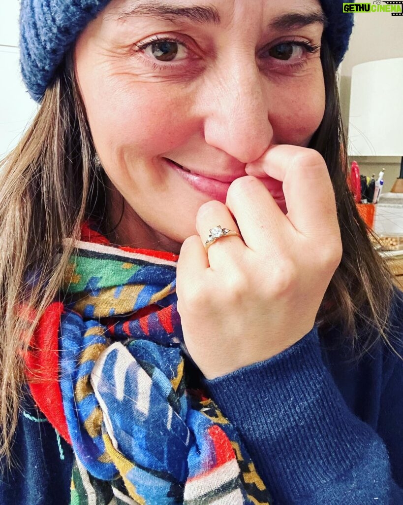Sara Bareilles Instagram - We have been engaged for a year and this is the ring we chose- we picked it up yesterday. We bought the gold leaf at an arts fair in Mexico City last December because looking for a ring started to feel like it was distorting and eclipsing the beauty of choosing each other. Joe found this ring at an antique store upstate. I was buying tiny lamp shades. (So cute!) It didn’t fit my finger so I was scared to take the leap. I had been thinking I should go get something custom or really hunt for the “right ring” so I balked at it. We drove back to our house without it and talked about the concept of the ring. That it is something he wants to give me, not just get for me. That the leap of faith of not quite knowing if it was “the one” is just that. A leap of faith. And isn’t that life? I look at this ring and think of his big blue eyes and how sometimes they are pleading with me to let go and grow into something new with him. So I did. And we got it the next day and got it sized and now I just love that I see him when I look at it- I like looking at you @joetipps. Exceptional “hand holding things” pictures were taken by me. Please credit me I’m a very important photographer.