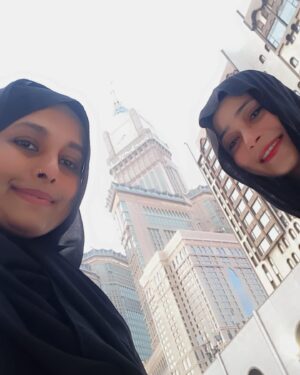 Sara Khan Instagram - I used to question why people visit religious sites just to take photos and show off, but when I visited Al-Haram, my family and friends were inspired by me and started planning their trips too. That’s when I realized the value of inspiring others. Now, I can include Umrah in my travel plans with friends, as they have become more open to the idea.. 
thank you @raheena.irshad my soul sister for being a part of this beautiful journey 🥰🥰🥰 .. by including umrah in my travel plan means , like they are more opened to the idea of letting a woman visit without their mehram, hence it’s easy to plan anytime to go to alharam even with your friends and family members ❤️
#umrahinramadan #blissss #happiness #blessed #alhamdulilah
P.s. I clicked these photos the next day after completing my umrah 
(The world can only improve if we begin to focus on the positives in every situation.)😊😇🙏
Since my lips were getting dry I applied the only cherry red lip balm I was carrying 🫣😂😜
