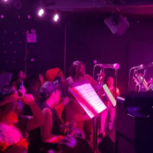 Sara Ramirez Instagram - 2.17.23
@cmoneverybodybk 🏳️‍🌈
@mariquitas.band 🏳️‍⚧️✊🏽🎶
This is what community looks like.
This is what liberation looks like. 
.
.
Videos: a rainbow of Black Brown Asian and white Queer and Trans people sharing space with each other in @cmoneverybodybk while holding space for the humanity, message, heart, talent, energy, and presence @mariquitas.band , a tgnc (trans and gender-non conforming) salsa band, brought last night. We danced the night away and freed ourselves. At some point Qween and co. inspired me to jump in and get free so I did. The last video is what happens when the set is over and you make your own music with each other. It was so joyful and generative to share space in an inclusive lgbtqia  culture that is for true liberation. Thank you @mariquitas.band for all that you are and all that you are building. @qween_jean @trudy0nduty @ohhbrent 🕺🏽💃🏾🎉♥️