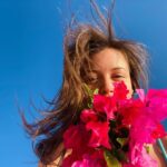 Sara Waisglass Instagram - thank you Turks and Caicos for reminding me to stop and smell the bougainvillea🌺 @beachesresorts #beachesturksandcaicos Beaches Turks & Caicos