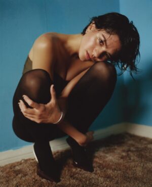 Sasha Calle Instagram - Thank you so much to Flaunt Magazine and the talented Joshen Mantai for going back in time with me, allowing me the space to reflect on my journey and my two loves - film and music. Grateful to YSL and Anthony for their support - I only wear skirts for you. Thank you to the beautiful team who laughed all shoot with me as I walked around saying I had “a bra bag” on in a very bad British accent. I am constantly inspired by all of you. I hope we continue to fight the barriers that are placed in front of us - together. x 

Credits:
@FlauntMagazine
Photographed by @JonnyMarlow
Styled by @Oliver_Vaughn wearing @YSL by @AnthonyVaccarello
Written by @Joshen_Mantai
Hair: @Virginie.Pineda
Makeup: @CedricJolivet
Flaunt Film: @JasonBergh
@Nue.Group @Monicajv 
#FlauntMagazine #UnderTheSilverMoonIssue