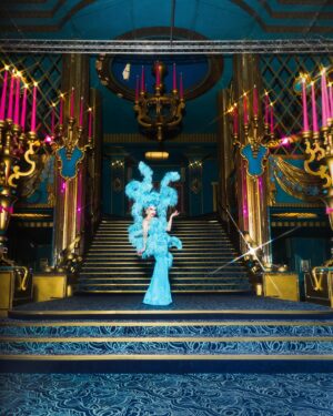 Sasha Velour Instagram - Merci Paris 🦋💎🌹

An extravagant moment in life— wearing a custom @serand_create dress and headpiece for my sold-out show at the @foliesbergere_officiel, channelling the original showgirls of Paris with an extra camp twist…all while traipsing about the haunted theatre with photographer @mettieostrowski to get these incredible photos! I might have cried a little. 

Plus I loved sharing the stage with the queen of FRANCE @thenickydoll! All around a dream come true. Merci bien!