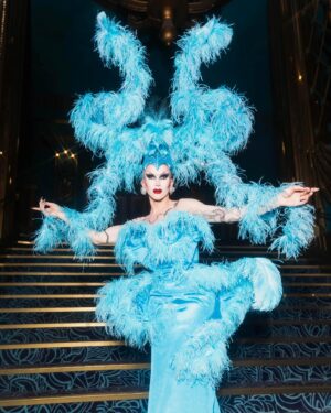 Sasha Velour Instagram - Merci Paris 🦋💎🌹

An extravagant moment in life— wearing a custom @serand_create dress and headpiece for my sold-out show at the @foliesbergere_officiel, channelling the original showgirls of Paris with an extra camp twist…all while traipsing about the haunted theatre with photographer @mettieostrowski to get these incredible photos! I might have cried a little. 

Plus I loved sharing the stage with the queen of FRANCE @thenickydoll! All around a dream come true. Merci bien!