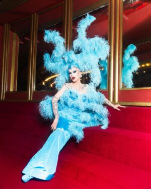 Sasha Velour Instagram - Merci Paris 🦋💎🌹

An extravagant moment in life— wearing a custom @serand_create dress and headpiece for my sold-out show at the @foliesbergere_officiel, channelling the original showgirls of Paris with an extra camp twist…all while traipsing about the haunted theatre with photographer @mettieostrowski to get these incredible photos! I might have cried a little. 

Plus I loved sharing the stage with the queen of FRANCE @thenickydoll! All around a dream come true. Merci bien!