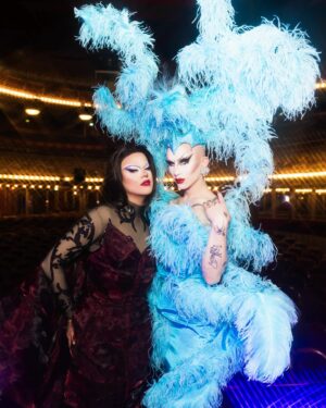 Sasha Velour Instagram - Merci Paris 🦋💎🌹

An extravagant moment in life— wearing a custom @serand_create dress and headpiece for my sold-out show at the @foliesbergere_officiel, channelling the original showgirls of Paris with an extra camp twist…all while traipsing about the haunted theatre with photographer @mettieostrowski to get these incredible photos! I might have cried a little. 

Plus I loved sharing the stage with the queen of FRANCE @thenickydoll! All around a dream come true. Merci bien!