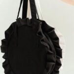 Shaina Magdayao Instagram - Let’s circle back to this modern ruffled bag. 🖤 FRILL CHIFFON Round bag with ruffles Colors: White, Black (featured), Army Green, Denim Sizes: Small, Large BAGS. CLOTHING. JEWELRY. SHOES. HOME #supportlocal 🤎 Shop responsibly for everyday canvas bags. DM to pre order: @organizedchicas Add to cart on Shopee: The Organized Chicas PH Browse our online catalogue, link in bio: https://linktr.ee/theorganizedchicas #theorganizedchicas #theorganizedchicaslifestyle #ecoconscious #ecofriendly #locallymadeph #supportlocalph #sustainbleph #bags #bagsph #canvasbag #totebag #circlebag #roundbag #ruffledbag