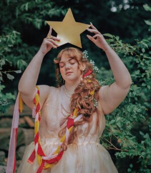 Shannon Purser Instagram - 🌷✨Backwoods Venus✨🌷

when I first saw these photos after our shoot in the summer, I didn’t know how to feel. they were beautiful. everything Valheria does is beautiful. she’s a true visionary and I consider myself so lucky every time we get to shoot together. the whole team behind these pictures is amazing and even though it was a humid, sweaty shoot in a creek that probably had snakes, it was a great day. so what was the hesitation?

I felt exposed. I felt overwhelmingly aware of my body and how short it falls of the beauty standards our society has indoctrinated us with. indoctrinated me with. ever since I was maybe 10, I’d internalized the idea that fat is one of the worst things you can be. I learned that if you are fat, your options are to punish your psyche and your body until you are not or try to compensate however you can. I got good at makeup. I am strategic about how much skin I show and where. I cast myself as the “mom friend” even when it felt wrong because, in my mind, being desirable wasn’t really an option. 

I’ve realized over the years that I’m not just strategic about revealing my body. I’m strategic about revealing my soul- who gets to know me and how well. sometimes that’s wisdom. other times, it’s just a debilitating fear of vulnerability-a reflexive shrinking away from a potential hurt. 

what I do know is that the hiding hurts more than the exposure. dreading the moments someone wants to see me in my entirety, body and soul, hurts. so, here I am, exposing myself. I am not confident. I am just refusing to let my fear keep me from living. I am just me. 

photos: the legend herself, @valheria123 (she also did my nails bc what can’t she do?)
makeup: @chandlerwest 
custom clothing and styling: @studio.tessafay 
hair styling and extensions: @_treyanthony @jessicawrighthair @your.mane.thing @melrosemcqueen 
assistants: the iconic @demetriusw @savanaogburn