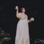 Shannon Purser Instagram - 🌷✨Backwoods Venus✨🌷 when I first saw these photos after our shoot in the summer, I didn’t know how to feel. they were beautiful. everything Valheria does is beautiful. she’s a true visionary and I consider myself so lucky every time we get to shoot together. the whole team behind these pictures is amazing and even though it was a humid, sweaty shoot in a creek that probably had snakes, it was a great day. so what was the hesitation? I felt exposed. I felt overwhelmingly aware of my body and how short it falls of the beauty standards our society has indoctrinated us with. indoctrinated me with. ever since I was maybe 10, I’d internalized the idea that fat is one of the worst things you can be. I learned that if you are fat, your options are to punish your psyche and your body until you are not or try to compensate however you can. I got good at makeup. I am strategic about how much skin I show and where. I cast myself as the “mom friend” even when it felt wrong because, in my mind, being desirable wasn’t really an option. I’ve realized over the years that I’m not just strategic about revealing my body. I’m strategic about revealing my soul- who gets to know me and how well. sometimes that’s wisdom. other times, it’s just a debilitating fear of vulnerability-a reflexive shrinking away from a potential hurt. what I do know is that the hiding hurts more than the exposure. dreading the moments someone wants to see me in my entirety, body and soul, hurts. so, here I am, exposing myself. I am not confident. I am just refusing to let my fear keep me from living. I am just me. photos: the legend herself, @valheria123 (she also did my nails bc what can’t she do?) makeup: @chandlerwest custom clothing and styling: @studio.tessafay hair styling and extensions: @_treyanthony @jessicawrighthair @your.mane.thing @melrosemcqueen assistants: the iconic @demetriusw @savanaogburn