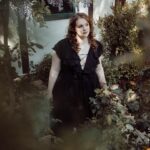 Shannon Purser Instagram - O October! Blanket me in auburn leaves and dappled sun. Speak to me in spectral winds and warm spice. Let me be not afraid of the darkness. Let me welcome the unknown to my hearth as an old friend and take its hand. Let the whispering ghosts both ancient and new come to greet me. I am a wandering spirit just like you. 🕸⚰️🖤🎃 •photos: @susieq• •hair/makeup: @blondiewoodbeauty• •clothing/location: @michelinepitt @la_femme_en_noir_•