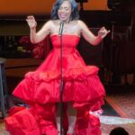 Sheryl Lee Ralph Instagram - Michael @michaelfeinsteinsings, darling, last night was fabulous! I thought I was there to sing, but from the applause, it seems my red dress was the star of the show. Thank you for having me! ❤️❤️❤️ Styled by @ivycoco23 Dress by @monsooriofficial Hair by @sharifposton Makeup by @marquiswardbeauty