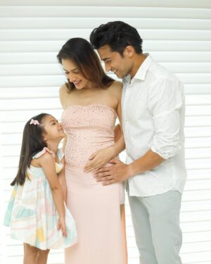 Smriti Khanna Instagram - After a journey filled with more challenges than we ever expected, we are overflowing with emotion as we make this beautiful announcement: Our family is growing! Our darling daughter Anayka is stepping up to the role of big sister, and our dog Lucas is about to become the best big brother. We’ve dreamed of this moment and fought through tough times to get here. Our hearts are full as we share our joy with you. Baby #2 is on the way, and we couldn’t be more excited to meet our newest love. Here’s to new adventures and endless love as a family of four... plus paws! 
September ‘24 it is! ✨👨‍👩‍👧🐶👶🤍