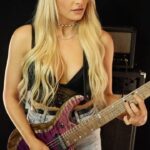 Sophie Lloyd Instagram - Getting some nice clean tones on my last shred version with the @kieselguitars SL6X 💜 Get ready for a new video tomorrow over on my YouTube channel!! 🎶 Sultans Of Swing - @direstraitshq #sultansofswing #direstraits #markknopfler #rockguitar #guitar #guitarist #guitaristsofinstagram #girlguitarist #kieselguitars #newmusic