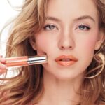 Sydney Sweeney Instagram - A little bts of my Prisma Glass campaign ✨ embodying the multi dimensional lip gloss and it’s stained glass finish. Credits: @damon_baker #Armanibeauty #ArmaniPrismaGlass #GlassLips #Lipgloss