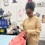 Tatyana Ali Instagram - Now, I said I love to sew; but for a project like this, I needed to go to a professional! Enter @auntfunkyscloset, who brilliantly manufactured my design. She and her team at @thekutstudios sewed these quilts using the Ankara fabrics I brought home from my trip to Ghana last year. Here’s a sneak peak at the process! Michelle, I can’t thank you enough for helping us bring baby-yams.com to life! 🤎