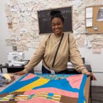 Tatyana Ali Instagram - Now, I said I love to sew; but for a project like this, I needed to go to a professional! Enter @auntfunkyscloset, who brilliantly manufactured my design. She and her team at @thekutstudios sewed these quilts using the Ankara fabrics I brought home from my trip to Ghana last year. Here’s a sneak peak at the process! Michelle, I can’t thank you enough for helping us bring baby-yams.com to life! 🤎