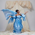 Tatyana Ali Instagram - When it came time to create visuals for track 6, I Wonder As I Wander, @capsocagency reached out to the incredible multimedia artist, @trokonv, who had this amazing idea entitled “A Floating Sculpture.” The moment I saw his drawings and idea, I knew his creative direction was a perfect fit for the sentiment of this song. He built the set, sourced these fabrics to wrap around me as a dress, created my flower crown, and was the photographer for the concept. I’m so amazed at how this idea came to life, and I can’t wait for you to see the music video for this song! Production: @lex_topia, @capsocagency Creative Direction: @trokonv Photography: @trokonv Set Design: @trokonv Wardrobe: @trokonv Makeup: @mattiemariemakeup Hair: @nikedoesmyhair Location: @1043mixedmedia