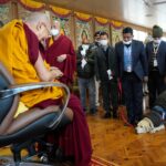 Tenzin Gyatso Instagram - A sniffer dog salutes His Holiness the Dalai Lama, joined by vigilant security personnel, embodying a shared commitment to respect and safeguarding. #dalailama #security #snifferdog