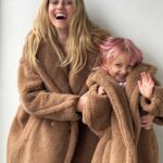 Teresa Palmer Instagram - Cosy cuddles ✨ Celebrating ten years of the iconic Teddy Coat with my mini me. @maxmara #MaxMara #TeddyTen #noaninalsharmedinthemaking