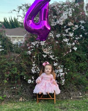Terra Jolé Instagram - And just like that, we have a four year old.  The week before the world shut down you were born baby girl.  One of the scariest and best times of our life.  Everyday I am grateful for you, every single day. 
You agreed to take photos as long as you could have your chicken nugget. 🤌🏼 🤣 Who am I to deny anything from you on your birthday? the last photo is maintaining her rank as queen 👸🏼of side eye. 🤟🏼 #magnoliaaugust