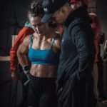 Tia-Clair Toomey Instagram - The credit belongs to the woman who is actually in the arena, whose face is marred by dust and sweat and blood; who strives valiantly; who errs, who comes short, because there is no effort without error and shortcoming; but who does actually strive to do the deeds; who knows great enthusiasms, the great devotions; who spends herself in a worthy cause; who at the best knows in the end the triumph of high achievement, and who at the worst, if she fails, at least fails while daring greatly, so that her place shall never be with those cold and timid souls who neither know victory nor defeat. “The Man In The Arena” (remix) President Theodore Roosevelt #GOAT #InTheArena 📷: @emomphoto