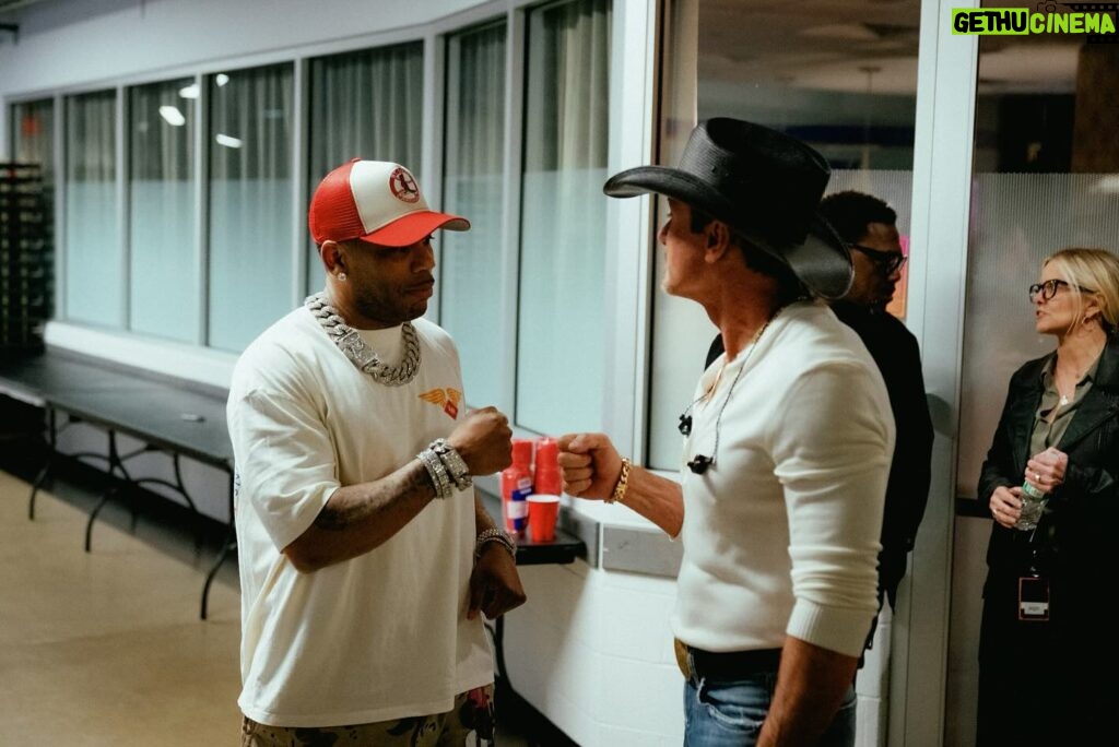 Tim McGraw Instagram - Gonna replay this moment over and over again…. Thanx @nelly for the big surprise in STL last night!!