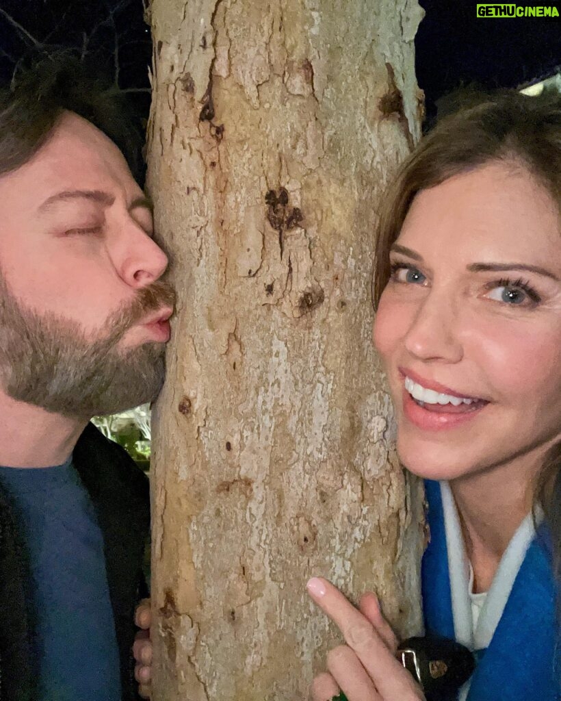 Tricia Helfer Instagram - Just two weirdos trying to regain composure for a decent photo after randomly hugging trees. So good to see your face in person again @chrisrafferty Love ya 😘