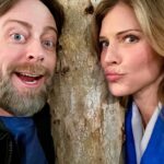 Tricia Helfer Instagram - Just two weirdos trying to regain composure for a decent photo after randomly hugging trees. So good to see your face in person again @chrisrafferty Love ya 😘
