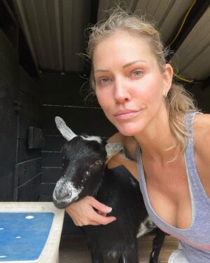 Tricia Helfer Instagram - Never fails — trying to get a pic with my “sweet” boy Earl, and my “naughty” boy Larry comes up and pushes him out of the way.  Sibling rivalry 🙄