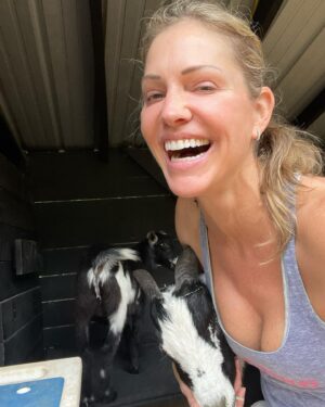 Tricia Helfer Instagram - Never fails — trying to get a pic with my “sweet” boy Earl, and my “naughty” boy Larry comes up and pushes him out of the way.  Sibling rivalry 🙄