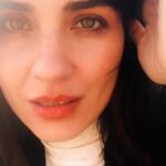 Tuba Büyüküstün Instagram - Sometimes joy comes with sunlight, not wearing sunglasses to see everything with their true colors.. turning the face to the light like as sunflowers do.. letting the hair free for the breeze to play a little… let the music caress your soul.. breath in , breath out.. and just be simply a human.. simply you Whoever you are..