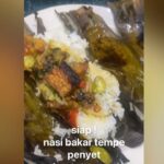 Umie Aida Instagram – Nasi Bakar tempe penyet bontot ayam paling simple masak. Cuma nak bungkus dengan daun pisang tu payah sikit. Perlu kesabaran dan cinta. Hmmm.. rasanya diriku kurang cinta bab masak2 ni. 🥱