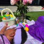 Uzo Aduba Instagram - What a great first Easter we had together as a family with baby girl. Weather said rain, but it’s been sunny blue skies all day. Couldn’t be happier:). Happy Easter everybody! He is Risen. 💜🐰🐣✝️ #easter