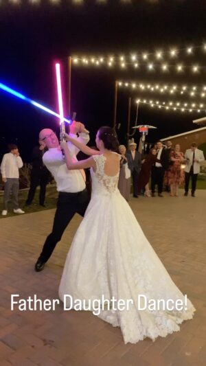 Vanessa Merrell Instagram - My Father Daughter Dance/Light Saber BATTLE with @vanessamerrell #maythe4thbewithyou #maythe4th  @john_vaughn @merrelltwins