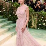 Victoria Beckham Instagram - British star, Phoebe Dynevor wore a custom Victoria Beckham gown to last night’s Met Gala. In a nod to this year’s ‘Sleeping Beauties’ theme, the ethereal silhouette was hand-crafted from archival lace, and embellished with over 300 lace appliqué flowers, hand-cut and hand-sewn onto a tulle base. Find out more in stories… #VBMetGala