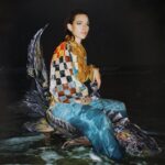 Victoria Pedretti Instagram - Sturgeon Rider acrylic paint on inkjet print (35 mm Kodak) photographer/shoot director: @gcrmccarthy painting: @aoksner clothing designer: @selina_sanders model: @then0t0ri0usvip mua/hair: @naturallydeij Currently on view as part of “Our Hour” group show @helmelstudios. Visible by appointment or during public walkthroughs: Monday 12/12/22 7-9pm Saturday 12/1722 7-9pm