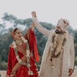Vrushika Mehta Instagram - Picking the red lehenga wasn't just a choice; it was like making a dream come true. Everything worked out exactly how I wanted! Thank you @asopalav ❤️ And how can I forget the traditional yet elegant veil made by my mom and @_usha_maurya aunty ❤️ Captured by: @smaryafilms Jewellery: @paldzigns.jewel #rabhdivrushyy #wedding