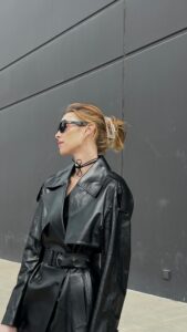 Whitney Port Instagram - The reality of getting ready with me is a frame probably will get knocked off the wall LOL. I can’t make this up. Nothing is perfect. Outfit deets: @mackage trench coat @7forallmankind jeans @prada balletflats @commesi socks @cosstores purse @spanx bra