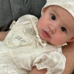 Yongwaree Anilbol Instagram - JMAC is now part of the Roman Catholic faith 🕊️ HALLELUJAH ✟ Joanna-marie’s baptism dress special made by @littlesisterofficial 💗🎀🌷