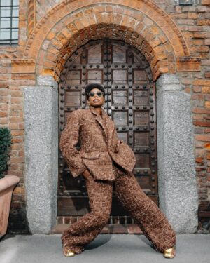 Yvonne Orji Instagram - I went Grace Jones for Tokyo James. 
•
OF COURSE I attended the Nigerian designer showing at Milan Fashion Week! Duh! And Omo Naija DID. NOT. DISAPPOINT! @tokyojamess your designs were beyyonndd! Sooo many pieces I’m coming for! Thank you for having me and reppin 🇳🇬🇳🇬🇳🇬 so lovely!!
•
Hair: @mitchellcantrellbeauty 
Makeup: @madeleinefeeney 
Suit: @tokyojamess 
Styling: @georgmedley 
Shoes: @driesvannoten 
Frames: @ysl 
Earrings: @zara 
Swag: on a hundred thousand trillion. 
Knee game: skrroong (but that lean almost took me clean out 😂)
📸: @modehunter 

#milanfashionweek #mfw