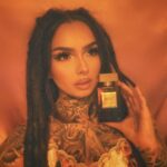 Zhavia Ward Instagram - If you ever wondered what I smell like 🤫 @dtellifragrances is what I wear everyday , everytime I wear it people ask me what it is🤤❤️‍🔥 The bottle is halfway gone🫢 D`Telli Opens up with a soft breeze of juicy Italian Blood Orange, over an exotic floral Heart of Tunisian Orange Blossoms, mixed with (day blooming) Royal Moroccan Jasmine and (night blooming) Arabian Jasmine. The dry-down is an addictive lingering skin scent of sultry Waves of amber and hints of vanilla ❤️‍🔥❤️‍🔥❤️‍🔥