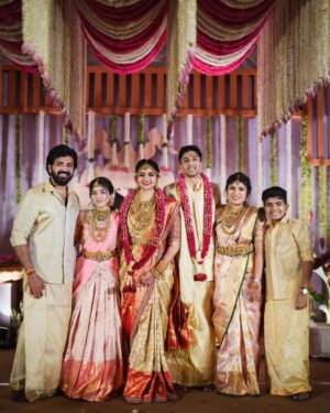 Aarthi Mohan Instagram - Our baby girl is now a married woman ♡
Diyu ma, you have been my no.1 daughter all these years and to see you grow from tide to tide, achieving your set goals made me prouder than all. You have set a standard and example so good to look up to for both my babies. Keep striving for the sky darling coz it ain't far for you! 
Dillan, the sweetheart you found for us to share our love is a keeper. Treasure your love both of you. Take care of each other like there is no one else better to do it. 
Your journey of Mrs. & Mr. has begun in nothing less than a fairytale, surrounded by so much love and happiness. Continue to stay blessed my babies♡ 
We are so happy to have been able to be an integral part of it all. 
Our family just got bigger!
Welcome Dillan, Trish, Jayshree Ben and Naren Bhai 🤗
.
.
.
#family #engaveetukalyaanam #diyasdill #togetherforever #weddingbells #bestmemoriesmade #happiness #celebration